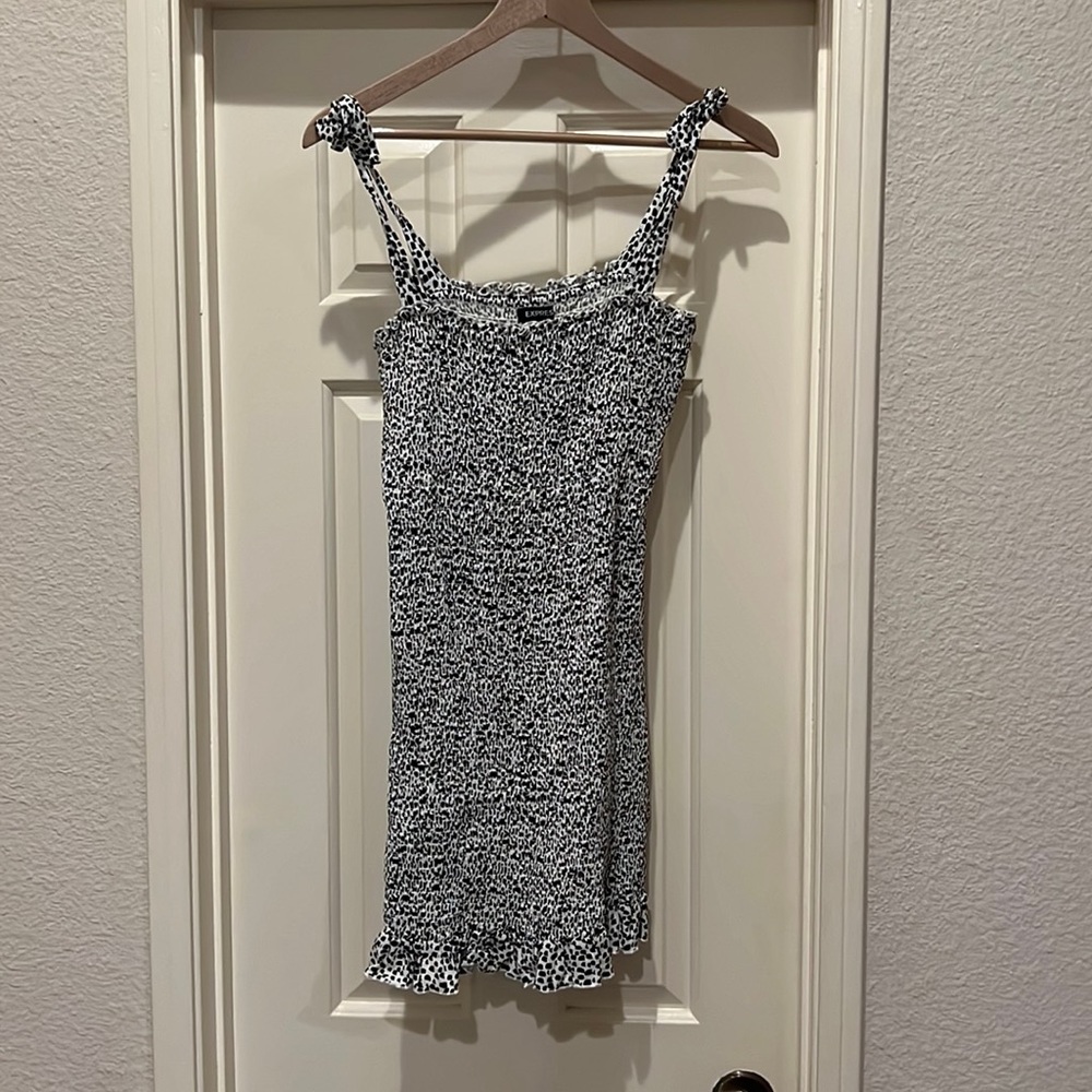Black and white ruche dress with bows at the shoulder